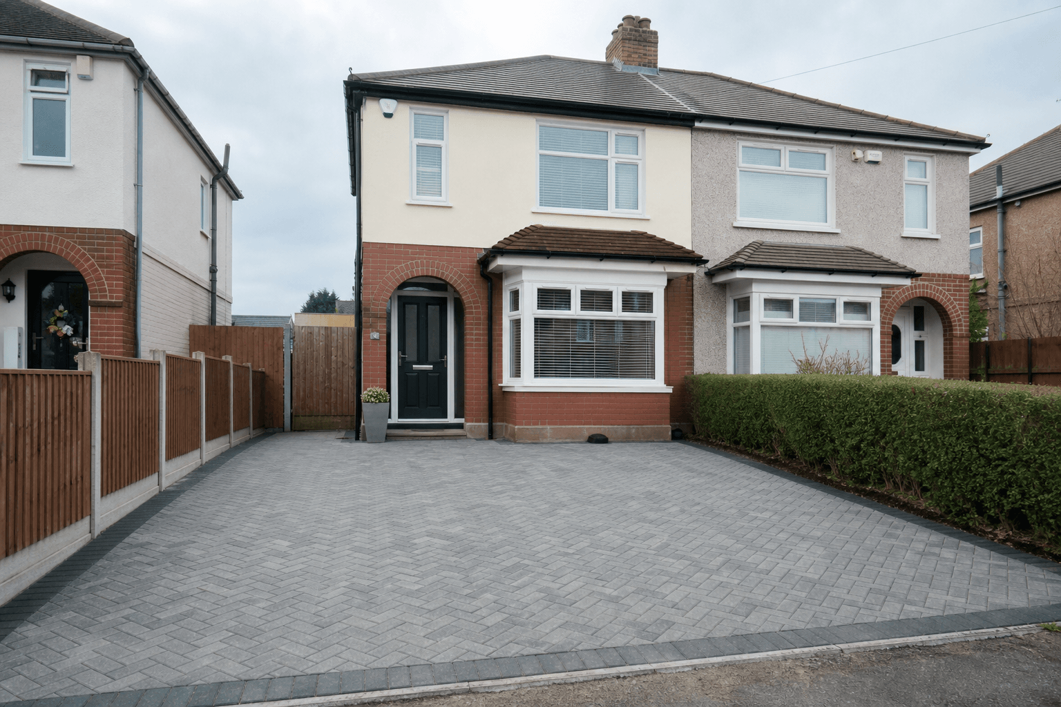 New block paving driveway on a UK semi-detached home, wide view