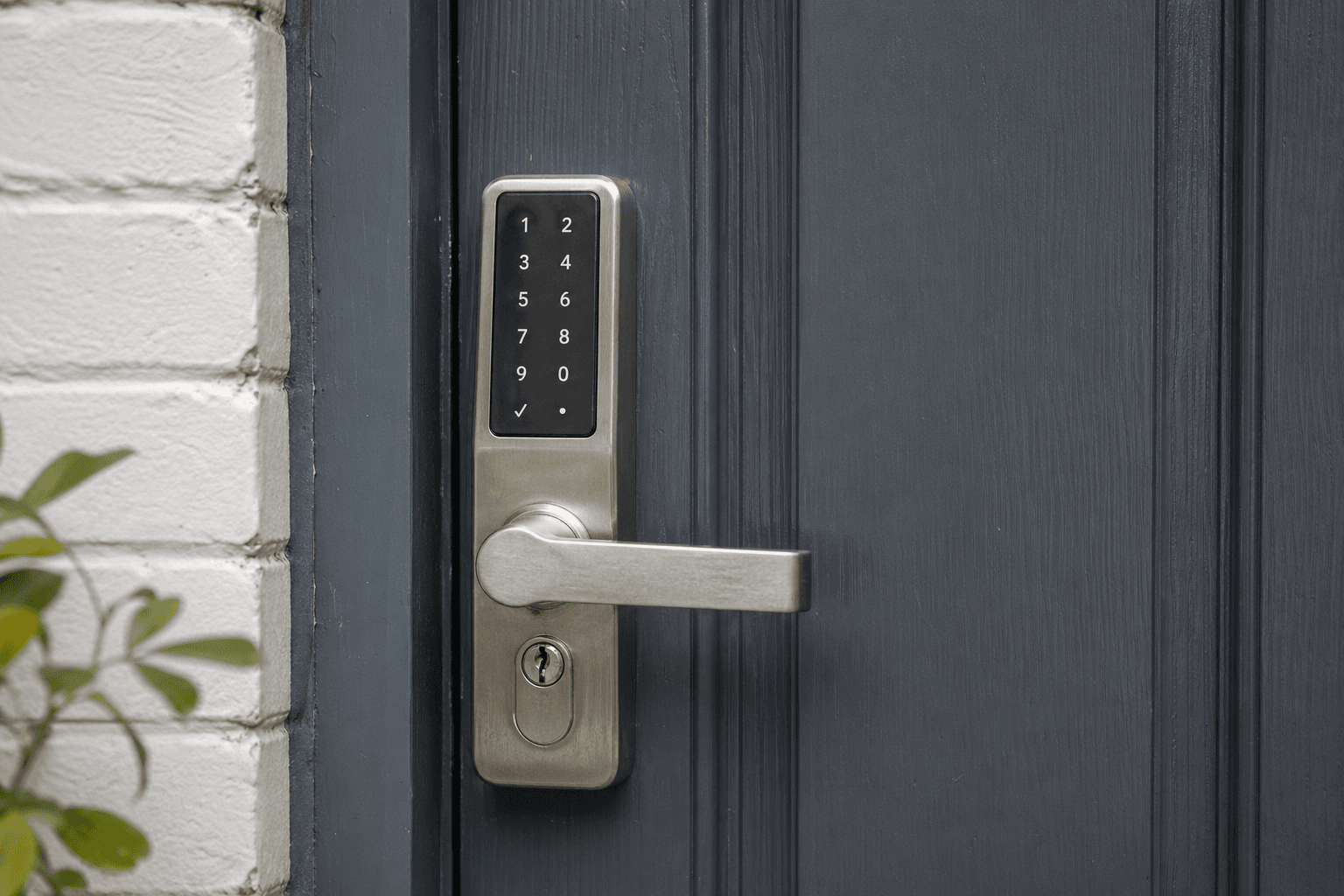 Electronic keypad smart lock on a UK front door close-up [dedupe:taskino:blog:smart-home-redo-lessons-uk:inline-2]